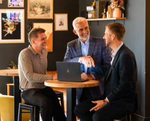 KaTom salesman sitting in meeting
