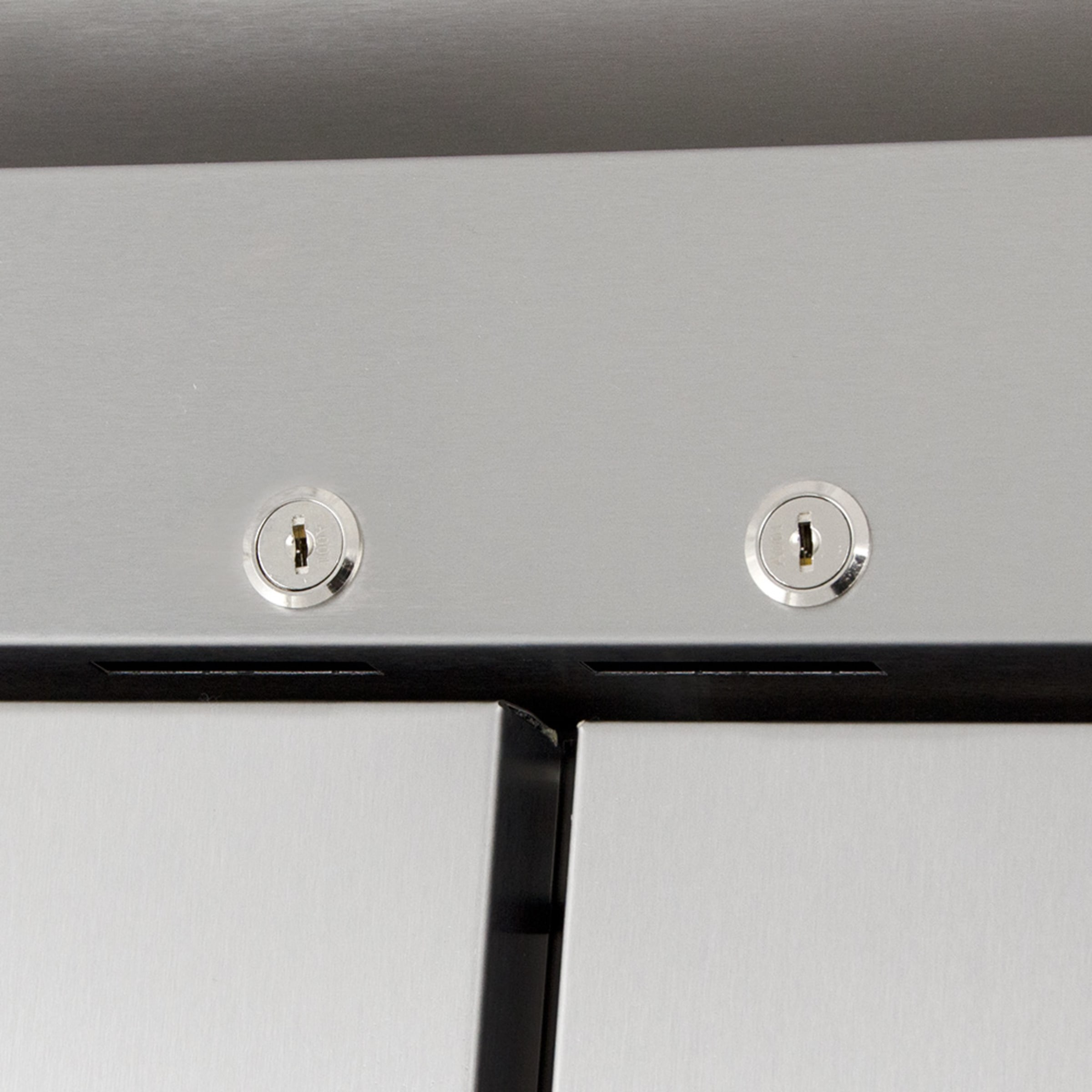 Close-up of the two door locks on the True T-43-HC reach-in refrigerator