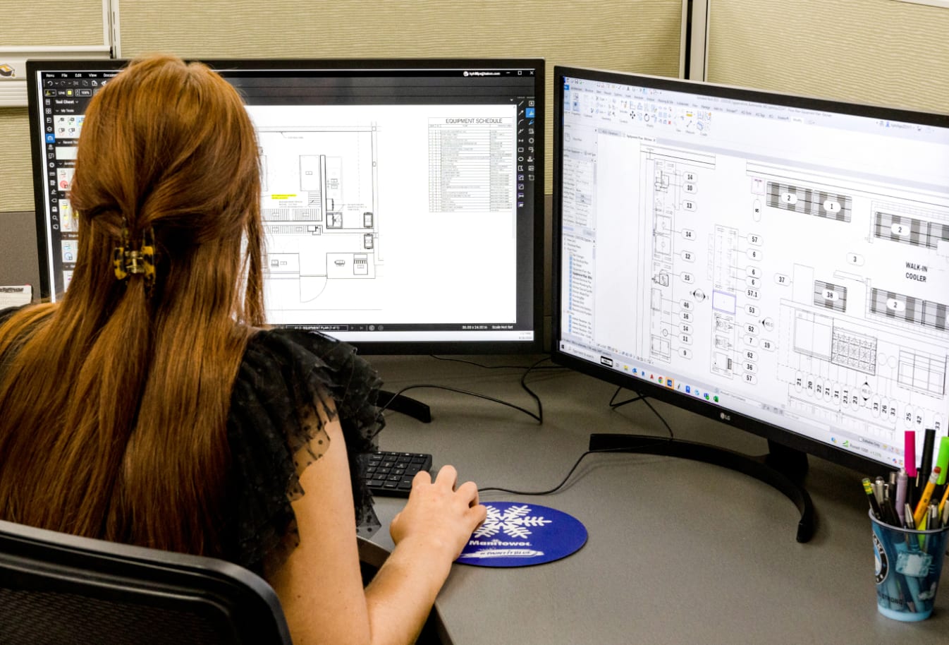 Image of a project designer working on a computer
